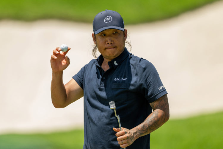 SINGAPORE, SINGAPORE - MAY 03: Anthony Kim of the United States acknowledges the crowd after holing out on hole 8 during day one of the LIV Golf In...