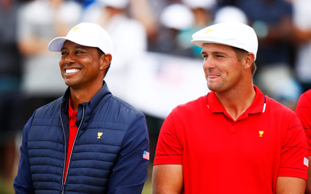 Tiger Woods stands with Bryson DeChambeau at the 2019 Presidents Cup