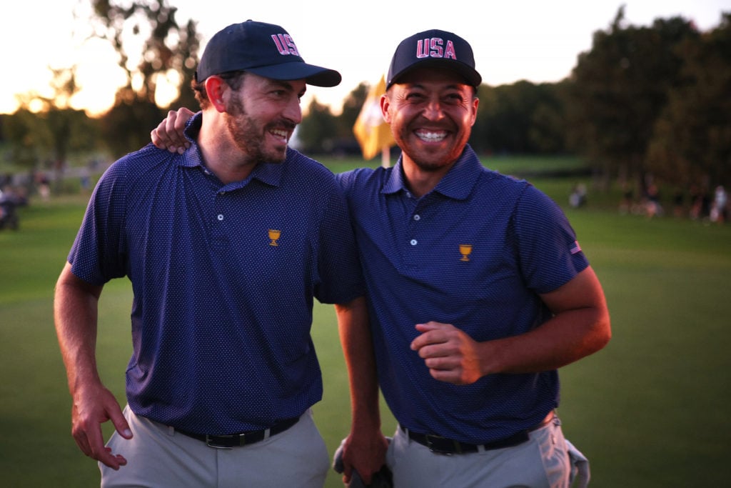 Patrick Cantlay and Xander Schauffele of the U.S. Team celebrate during Saturday Afternoon Foursomes on day three of the 2024 Presidents Cup