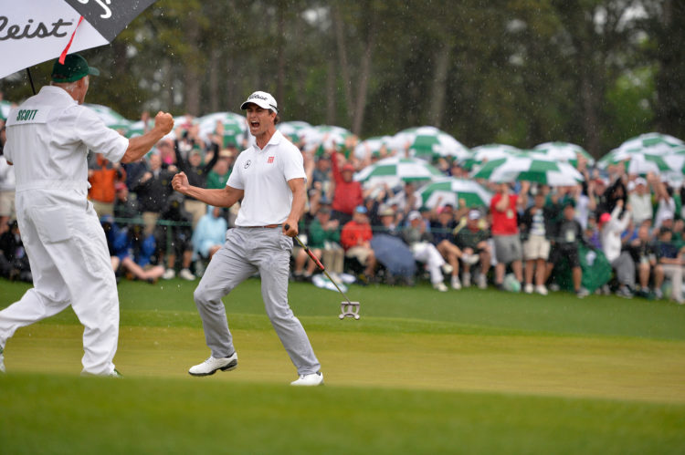 Adam Scott of Australia birdies No. 18 in regulation during Round 4 of the 2013 Masters. (Augusta National/Getty Images)