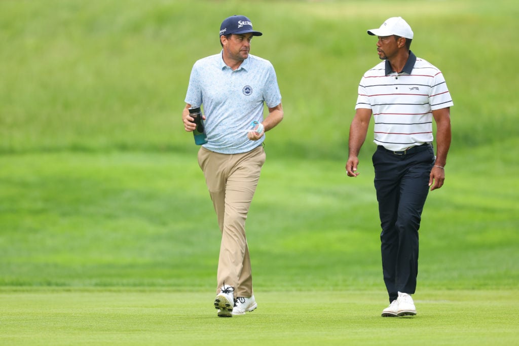 Keegan Bradley of the United States and Tiger Woods of the United States walk together during the second round of the 2024 PGA Championship