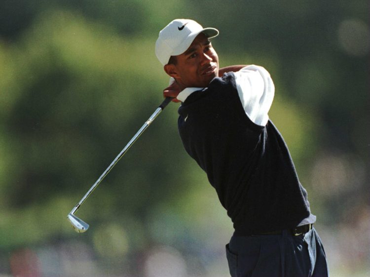 24 Oct 1996:   Tiger Woods of the USA fires his second shot on the 5th hole during the first round of the 1996 Tour Championship at Southern Hills ...