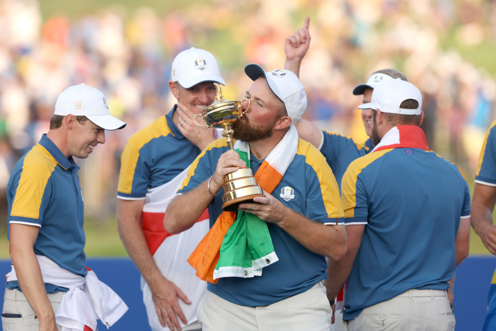 Shane Lowry of Team Europe kisses the Ryder Cup trophy following victory with 16 and a half to 11 and a half win following the Sunday singles matches of the 2023 Ryder Cup