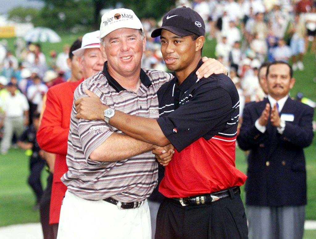 GOLF-WORDLCUP-US-HUGS