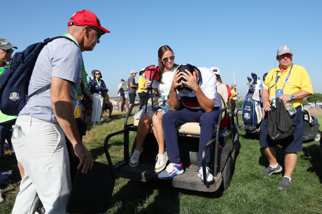 Scottie Scheffler looks dejected after losing at the 2023 Ryder Cup
