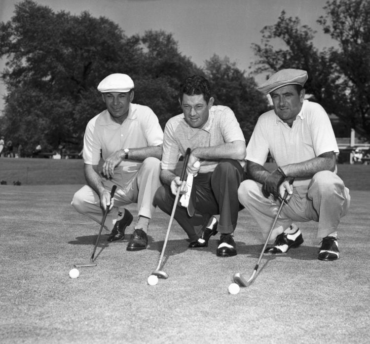 (Original Caption) Readying for this year's Masters Golf Tournament at Augusta are: (left to right) Ben Hogan, winner of the 1951 Masters; Cary Mid...