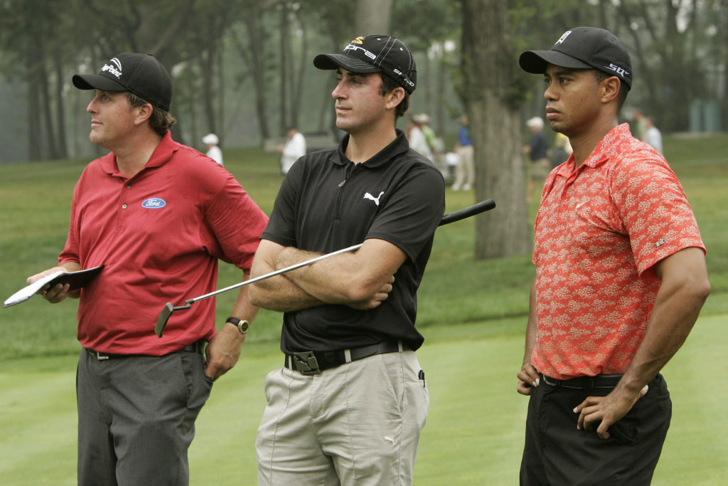 Phil Mickelson of the United States (L),