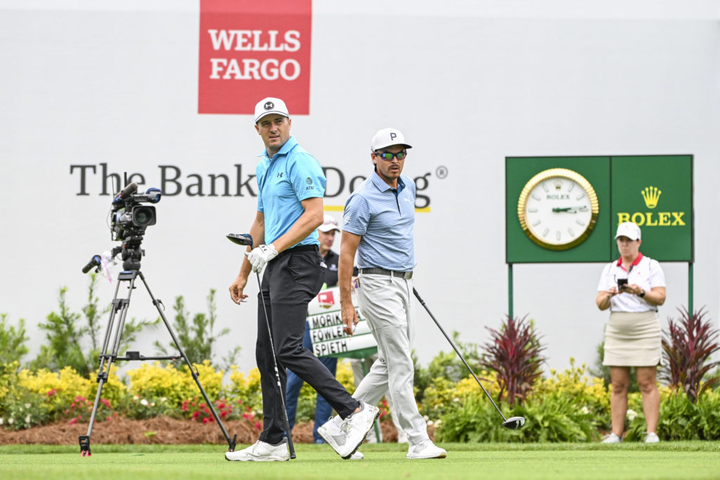 Jordan Spieth and Rickie Fowler tee off during the first round of the Wells Fargo Championship