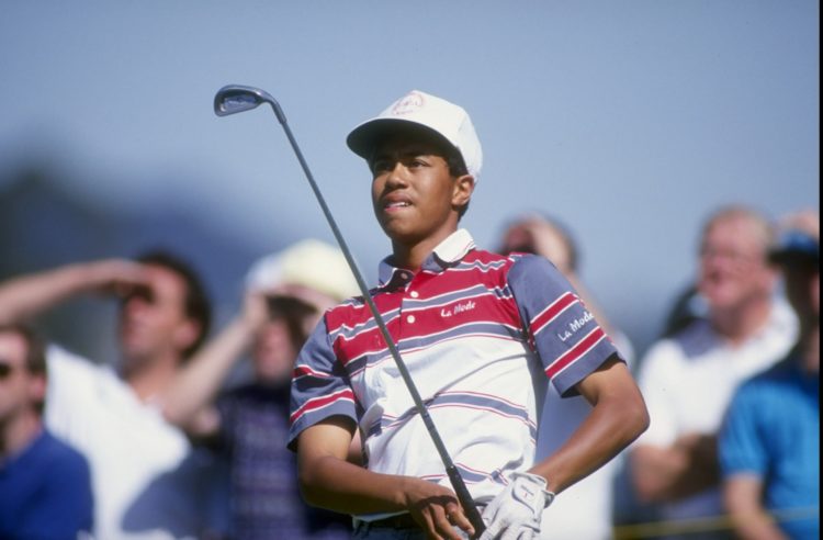 27 Feb 1992:  Tiger Woods watches his shot during the 1992 Los Angeles Open at the Riviera Country Club in Pacific Palisades, California. Mandatory...