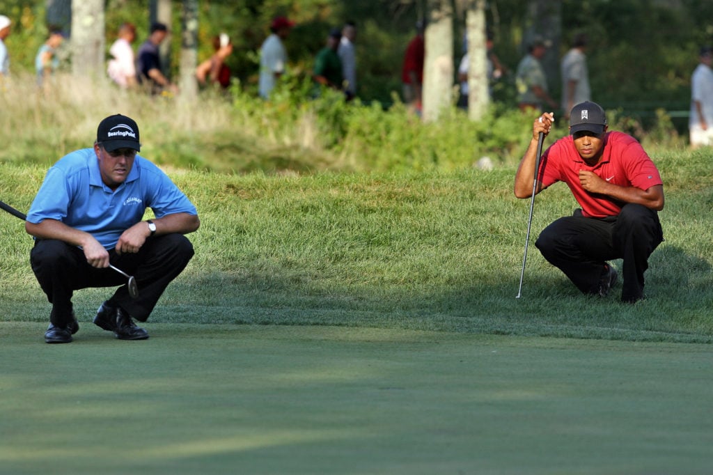 (090307).NortonMA)Final round of the DeutscheBank Championship golf tournament at TPC Boston.Phil Mickelson and Tiger Woods on the 17th green.(September03 2007. Staff photo by Nancy Lane)