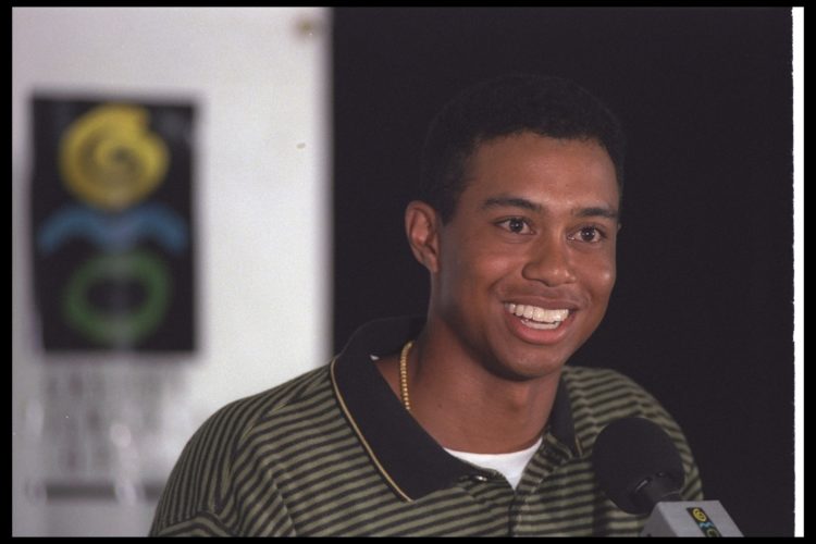 28 Aug 1996:  Tiger Woods speaks with charisma to an attentive audience during the Greater Milwaukee Open at the Brown Deer Park Golf Course in Gle...