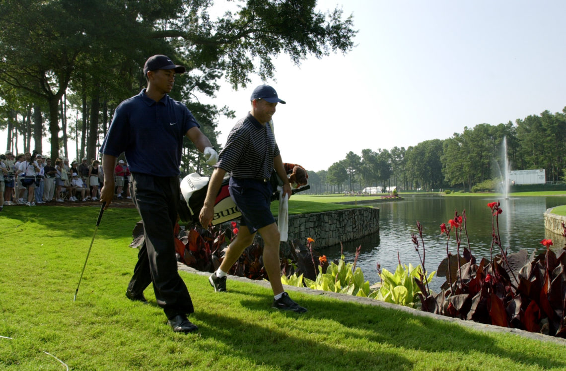 14 Aug 2001:  Tiger Woods and his caddie Steve Williams  walk together during a practice round prior to the start of the 2001 PGA Championship at t...