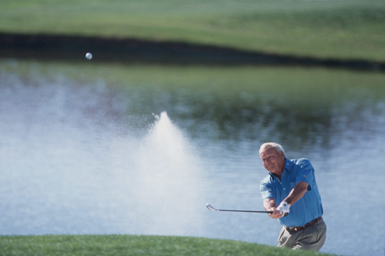 8 Dec 2001:  Arnold Palmer chipping the ball during the Hyunai Team Matches at the Monarch Beach Golf Club in Dana Point, California.Mandatory Cred...