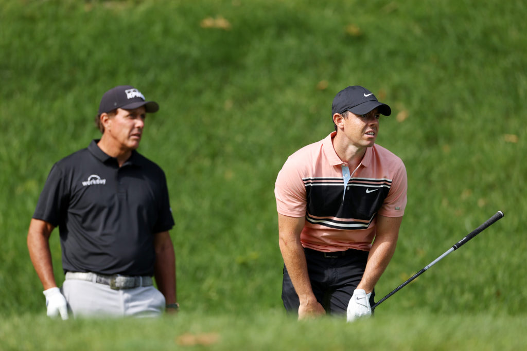 Phil Mickelson and Rory McIlroy in action at the Travelers Championship