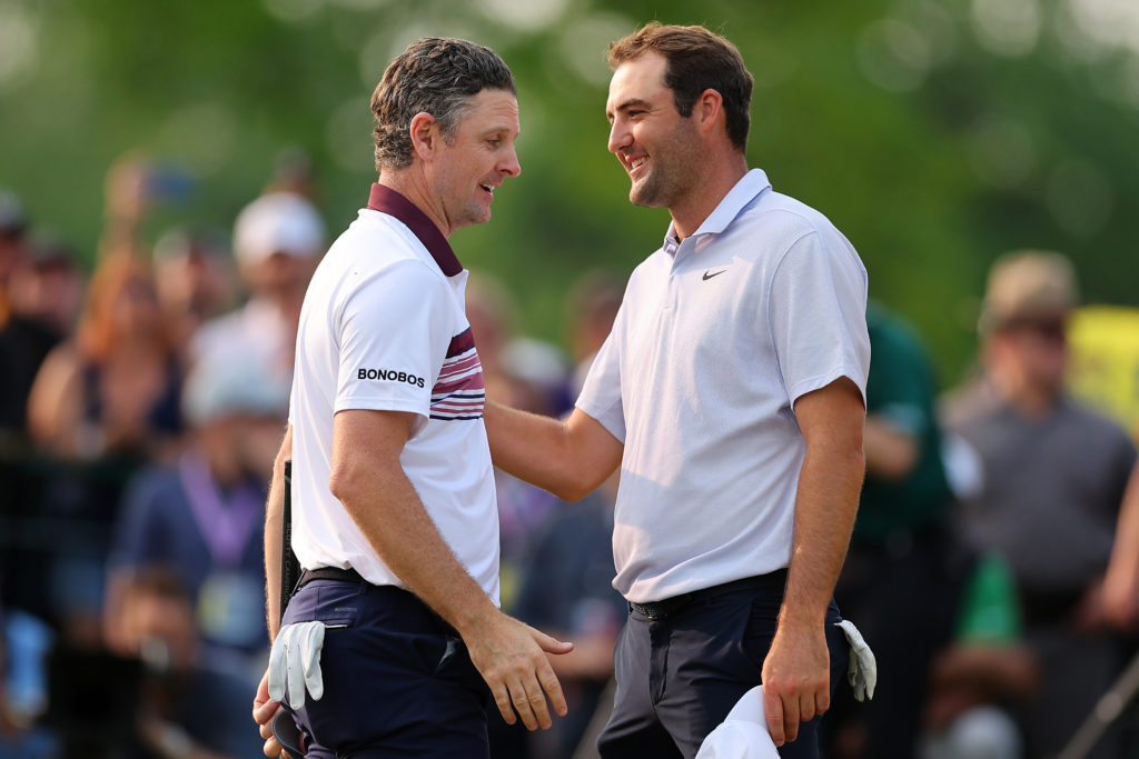 Justin Rose and Scottie Scheffler embrace during the 2023 PGA Championship