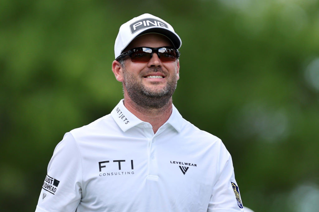 Corey Conners smiling during the third round of The Masters