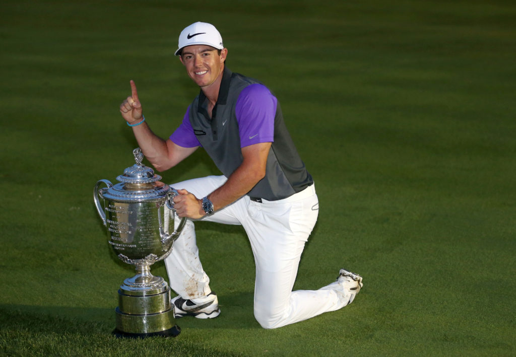 Rory McIlroy poses with the PGA Championship trophy