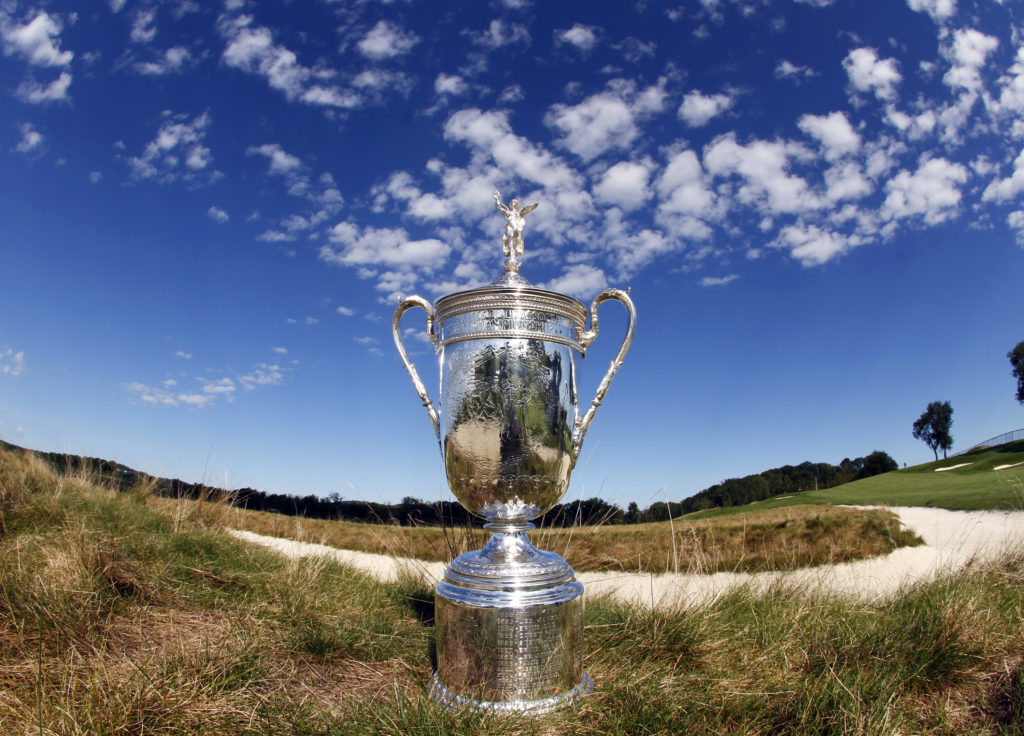 The US Open trophy nestled in amongst the church pew bunkers at Oakmont in 2016