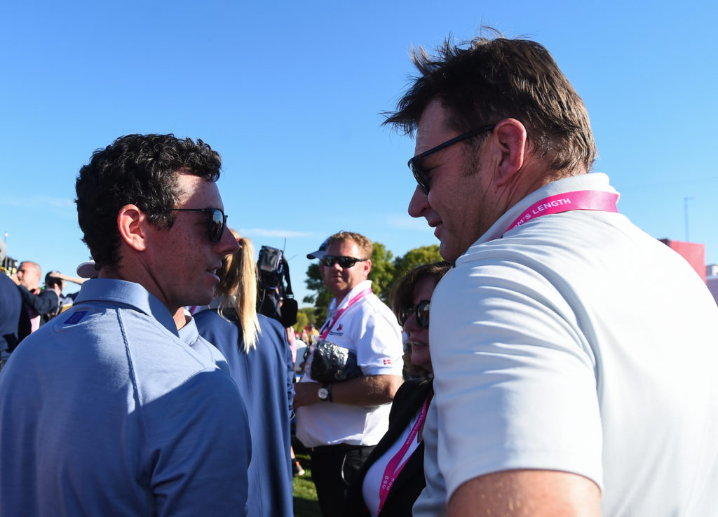 Sir Nick Faldo with Rory McIlroy during The 2016 Ryder Cup