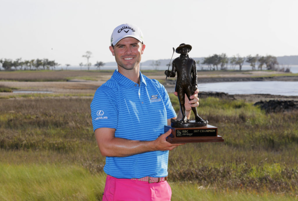 Wesley Bryan holding the RBC Heritage trophy