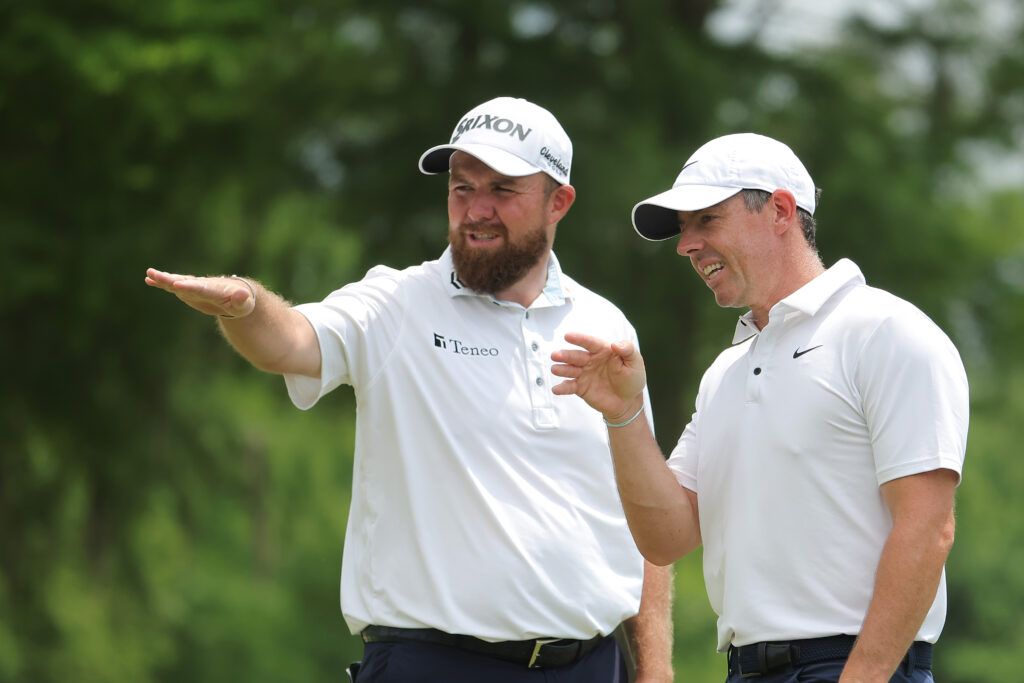 Shane Lowry of Ireland and Rory McIlroy of Northern Ireland watch on the seventh hole on day four of the Zurich Classic