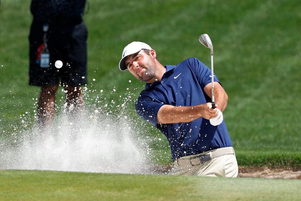 Scottie Scheffler plays out of a bunker at the PGA Championship