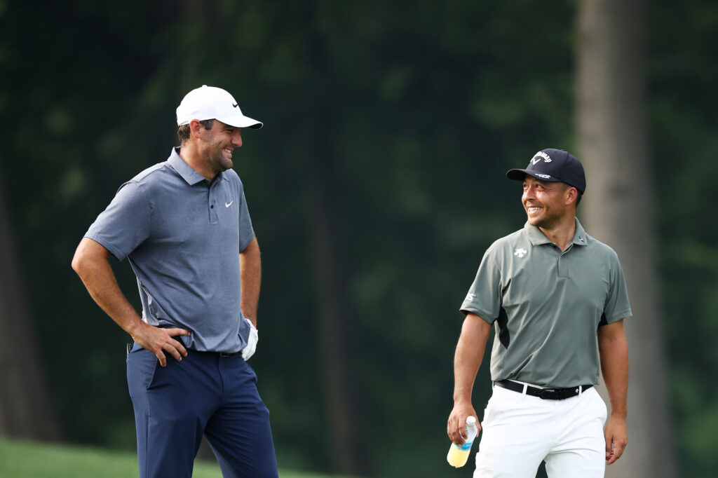 Xander Schauffele and Scottie Scheffler speak during the second round of the 2025 PGA Championship