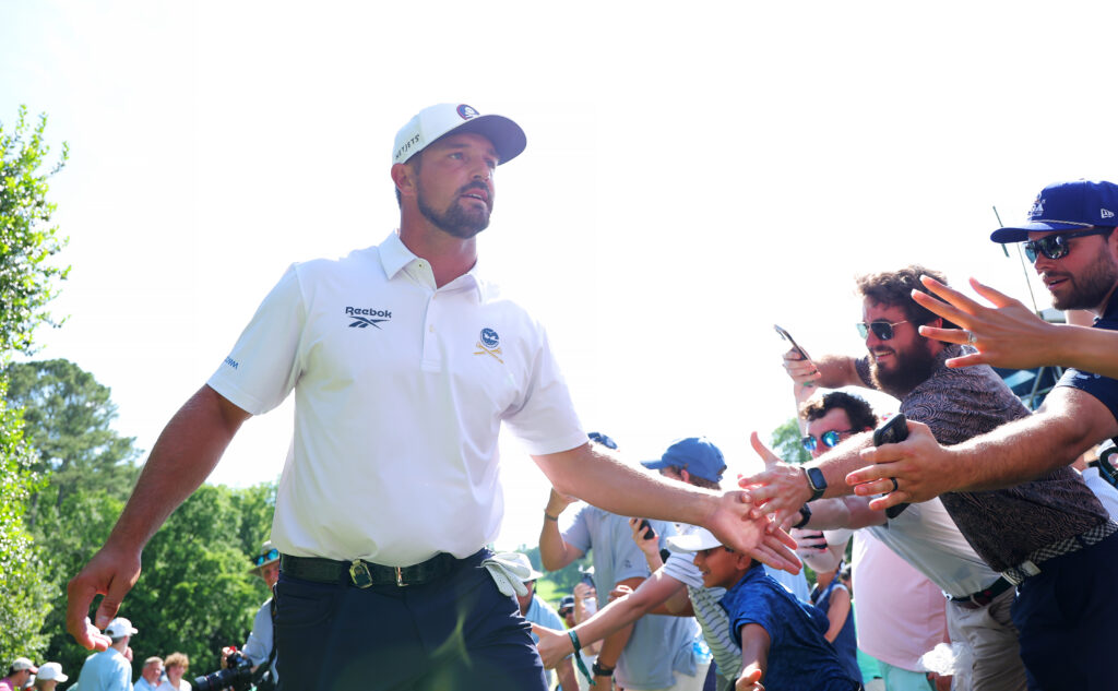 Bryson DeChambeau interacts with fans at the 2025 PGA Championship - Round Three