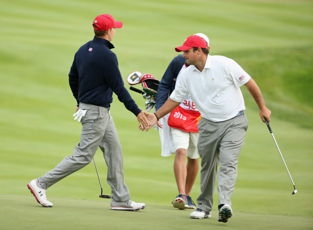 Patrick Reed and Jordan Spieth high five during the 2015 Presidents Cup