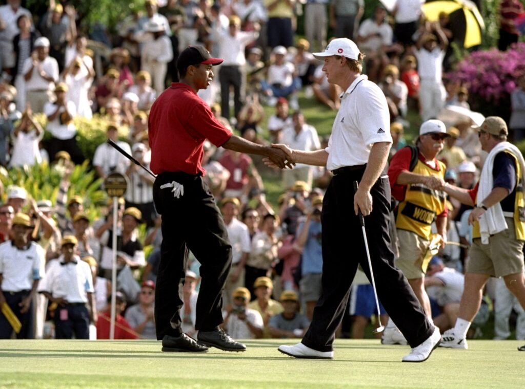 Tiger Woods and Ernie Els shake hands at the 1999 Johnnie Walker Classic