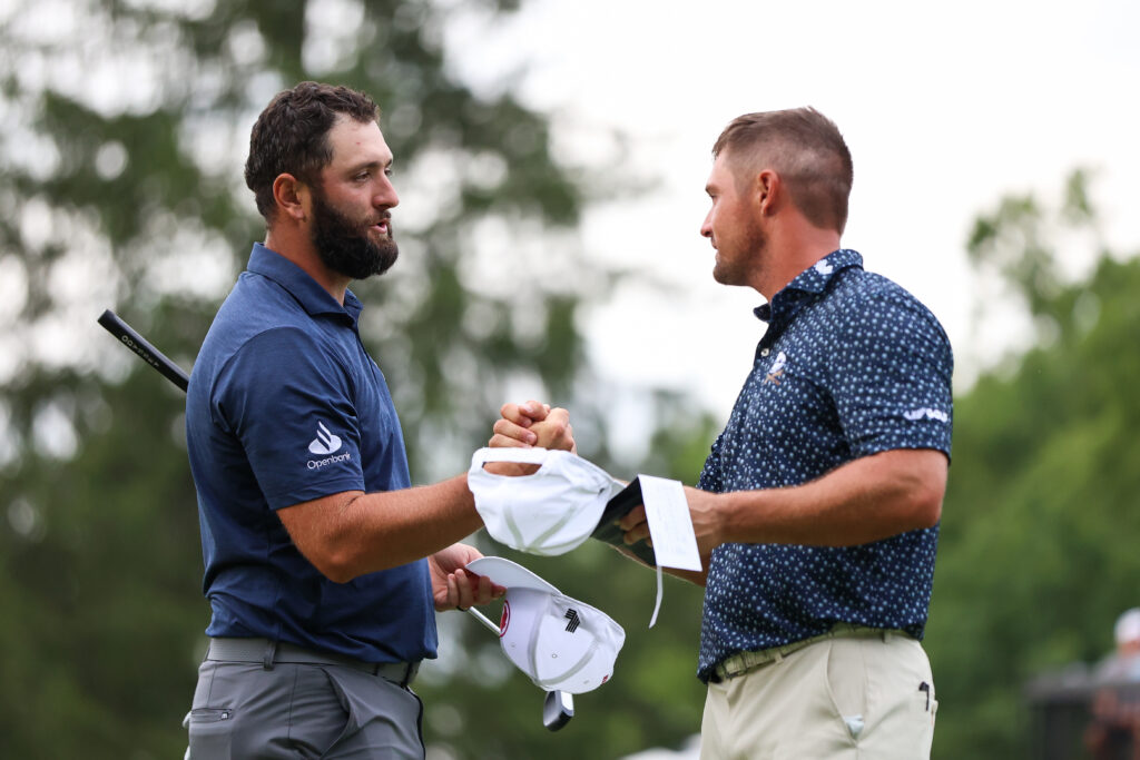 Jon Rahm and Bryson DeChambeau shake hands at LIV Golf Greenbrier