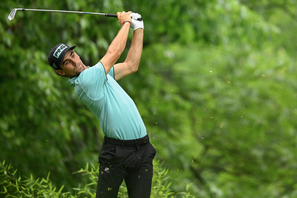 Joaquin Niemann hits an iron shot in round three of LIV Golf Virginia