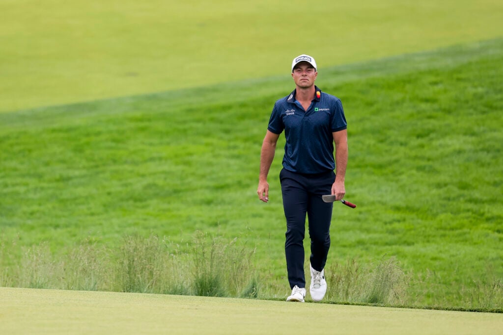 Viktor Hovland walks towards 11th green at 2025 US Open