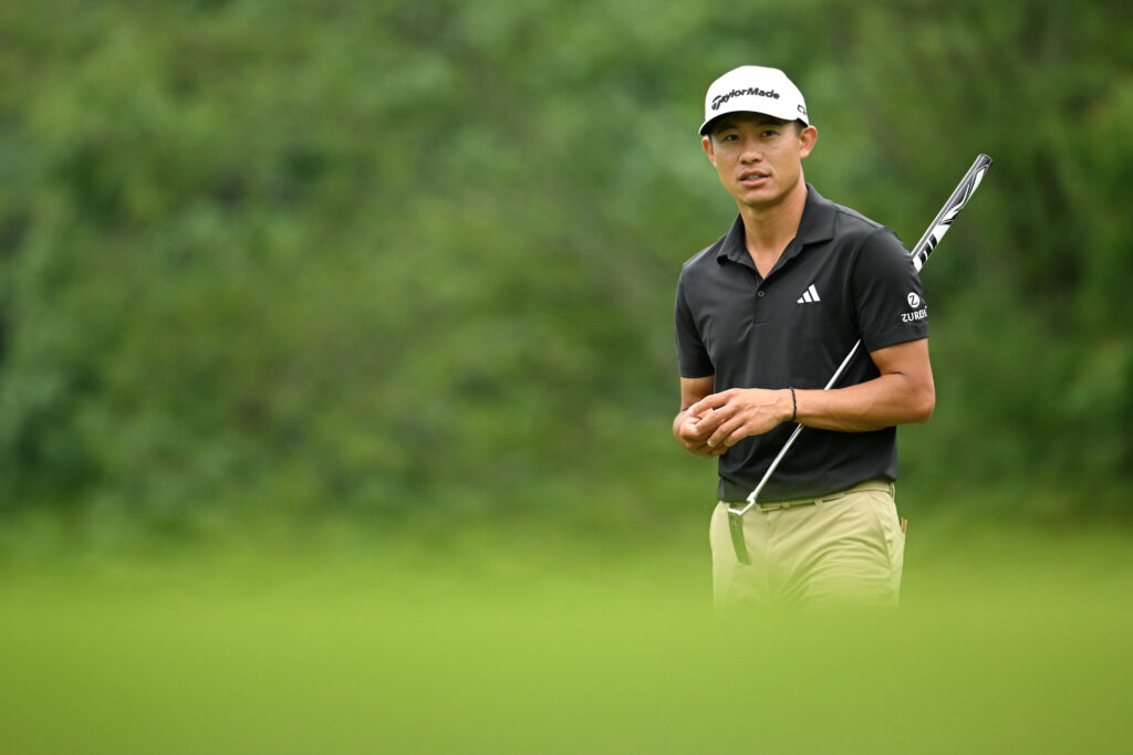 Collin Morikawa looks at making a putt in round one of the Travelers