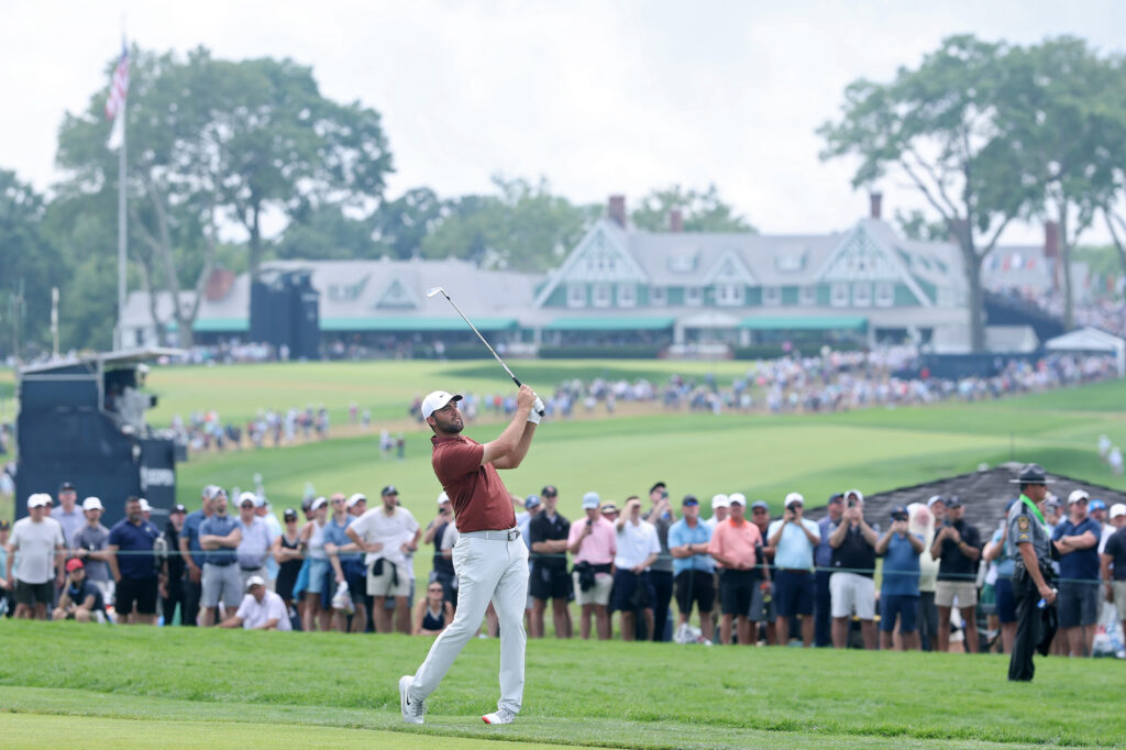 Scottie Scheffler hits an approach during the third round of the US Open