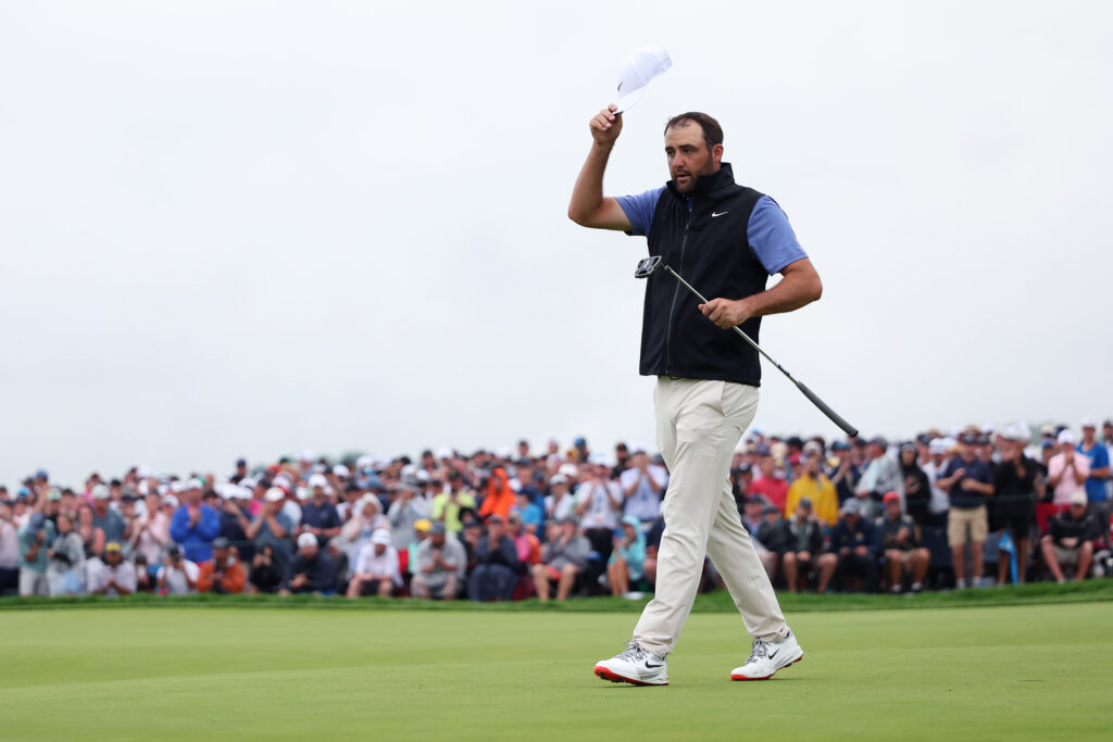 Scottie Scheffler acknowledges the crowd on the 18th green at Oakmont after the final round of the US Open