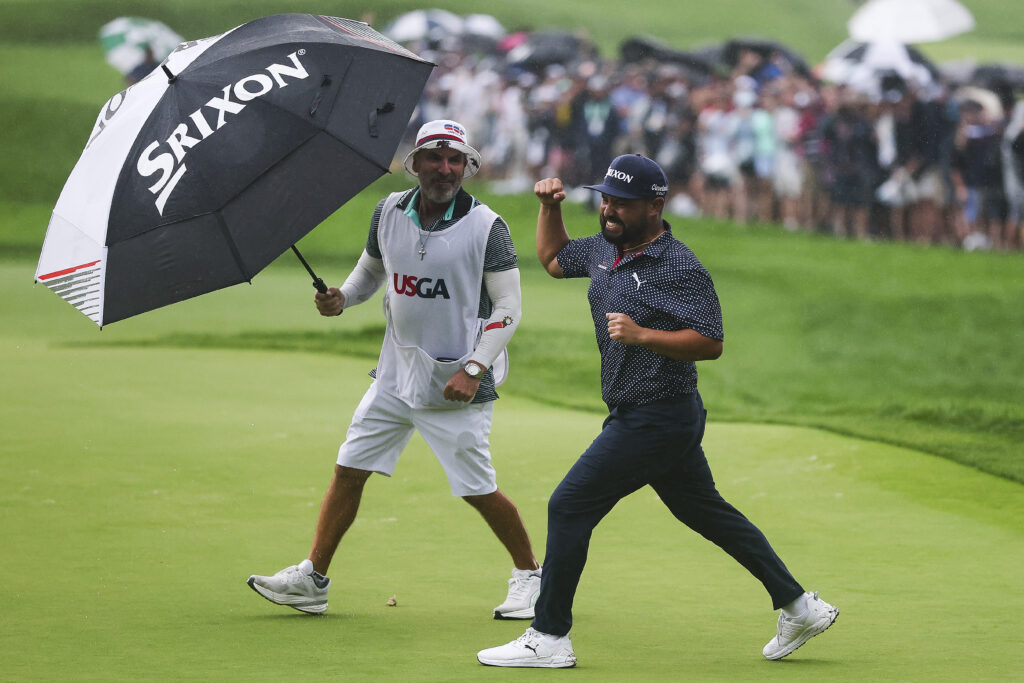J. J. Spaun celebrates with caddie Mark Carens after winning the US Open