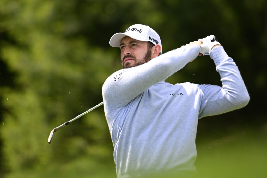 Patrick Cantlay hits an iron shot in round two of The Travelers