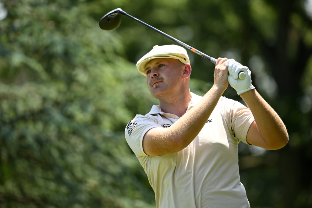 Harry Hall hits a tee shot during the final round of the Travelers Championship