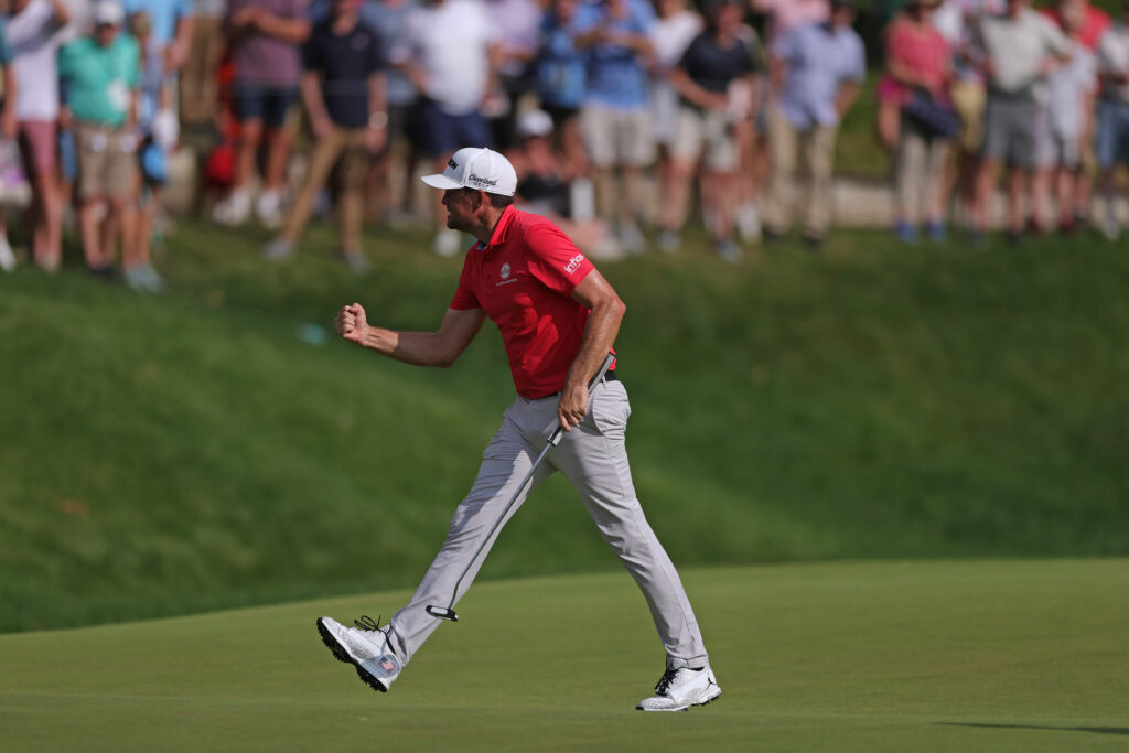 Keegan Bradley celebrates his putt to win Travelers Championship