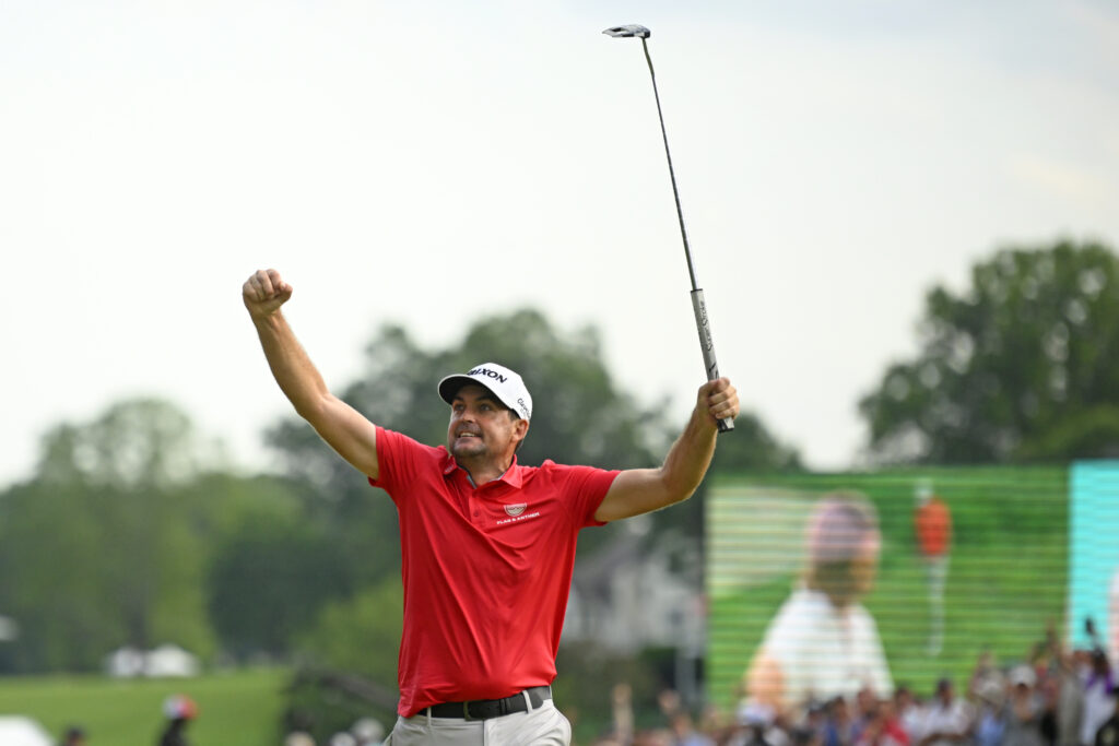 Keegan Bradley celebrates on the 18th green after winning the Travelers Championship