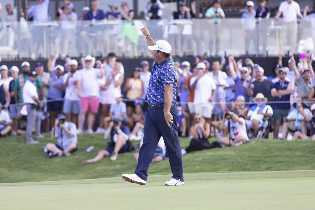 Patrick Reed celebrates after holing the winning putt at LIV Golf Dallas