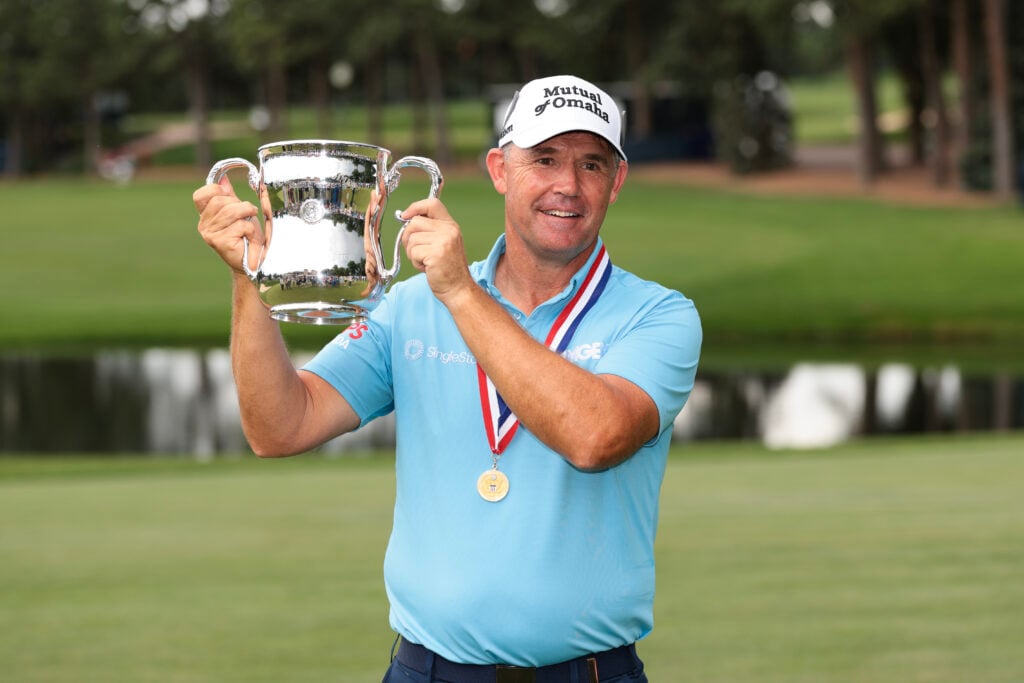 Padraig Harrington poses with US Senior Open trophy