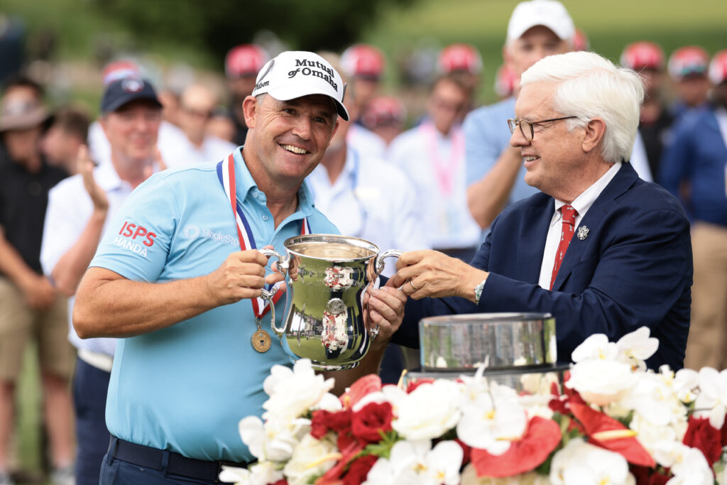 Padraig Harrington holds the US Senior Open trophy