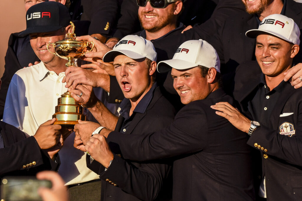Jordan Spieth and Patrick Reed celebrate winning the 2016 Ryder Cup
