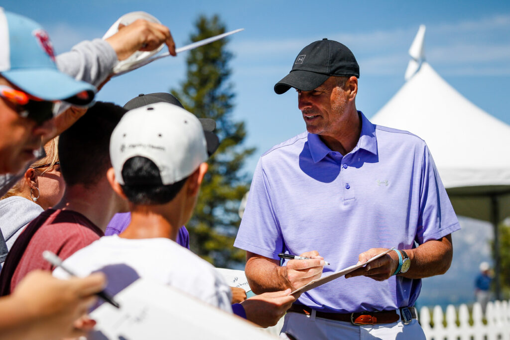 Jay Bilas signs autographs at the American Century Championship