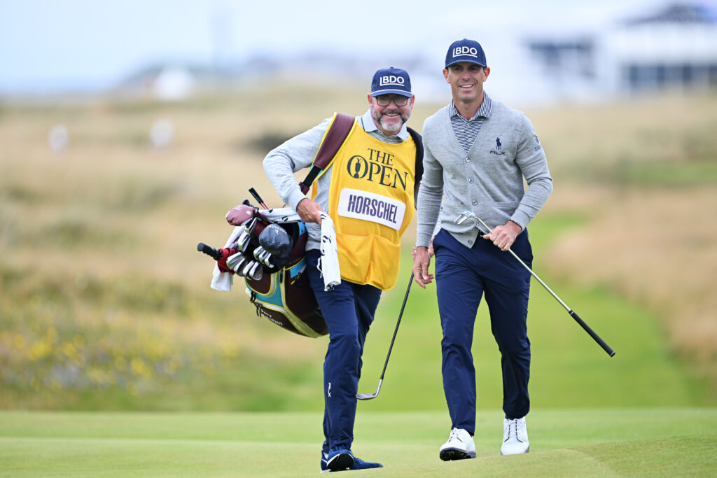 Billy Horschel speaks to his caddie during the final round of the 2024 Open Championship