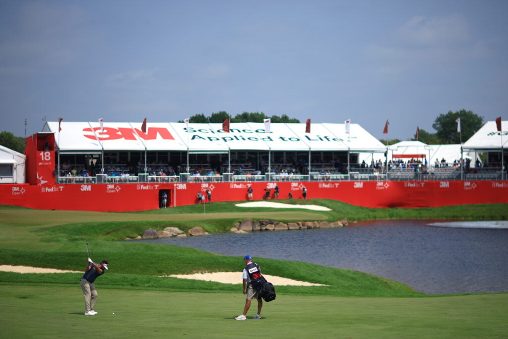 Matthew NeSmith plays a shot on the 18th hole at the 3M Open