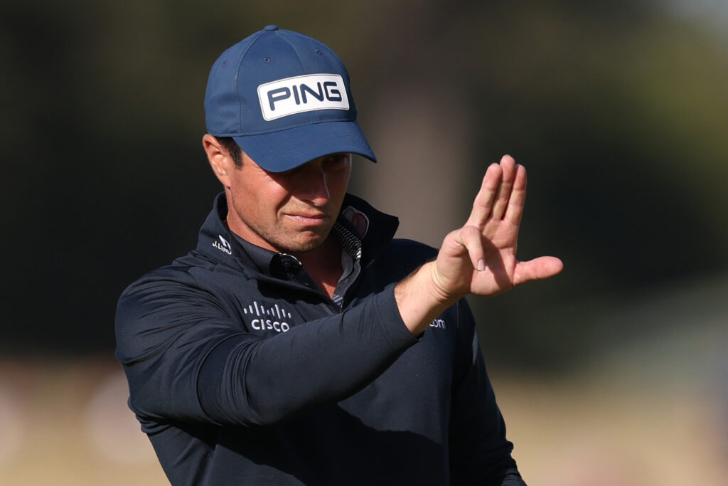 Viktor Hovland lining up a putt during round one of the Scottish Open