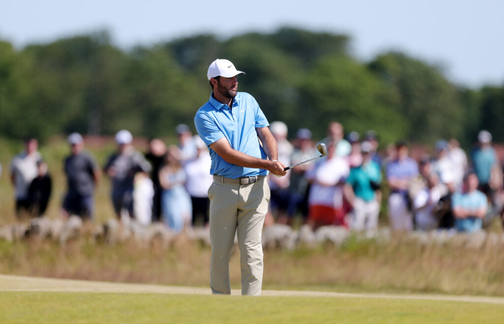 Scottie Scheffler hits a wedge shot on the fifth hole during the third round of the Scottish Open